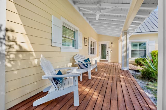 Private deck with Adirondack chairs
