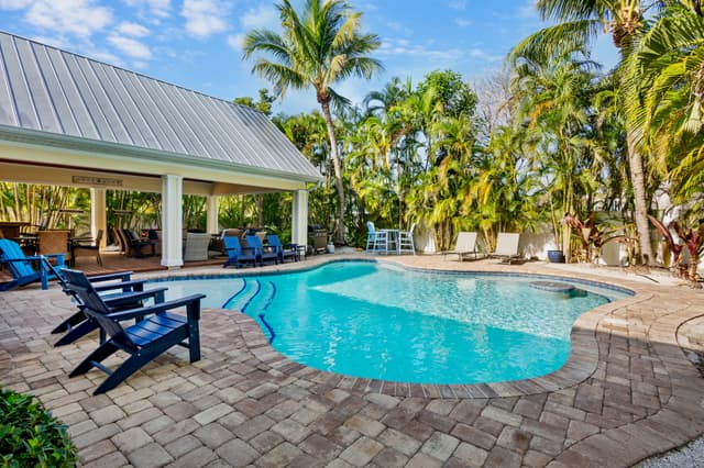 Tropical oasis with Adirondack chairs