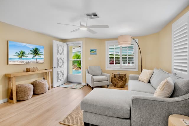 Living Room with Plush Seating and TV