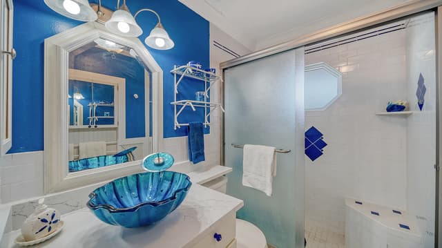 Bathroom with Rainshower- AMI Accommodations