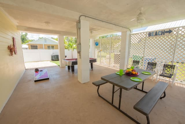 Covered Outdoor Area with Games - Pool and Corn hole