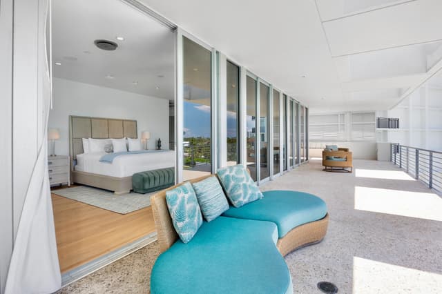 Primary Bedroom, Relaxing Balcony Lounge Area