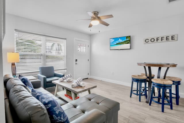 Living Room with Plush Seating and TV