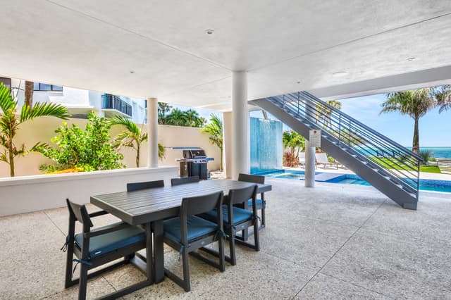 Dine Poolside with an Outdoor Grill and Gulf views