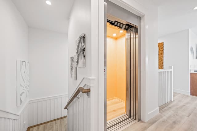 Top Floor Stairwell w/ Elevator