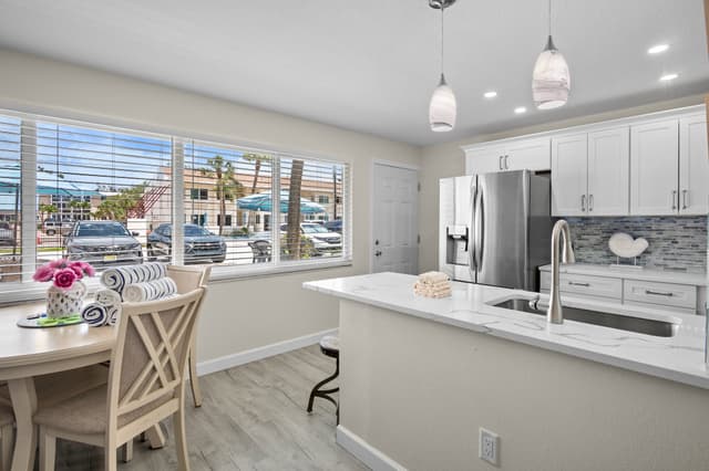 Stylish island with barstools