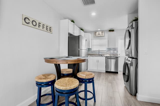 Modern kitchen with casual dining space