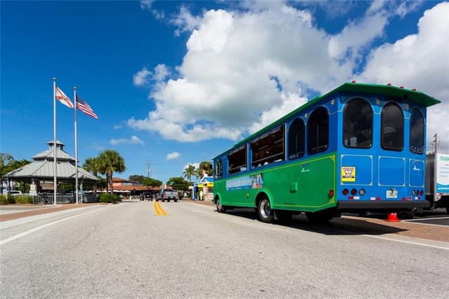 Ride the FREE Island Trolley to Iconic Siesta Village