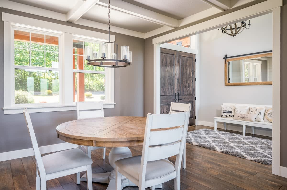 Enjoy family meals together at the dining room table. The round table in the dining room seats six and the kitchen tables hosts another eight!