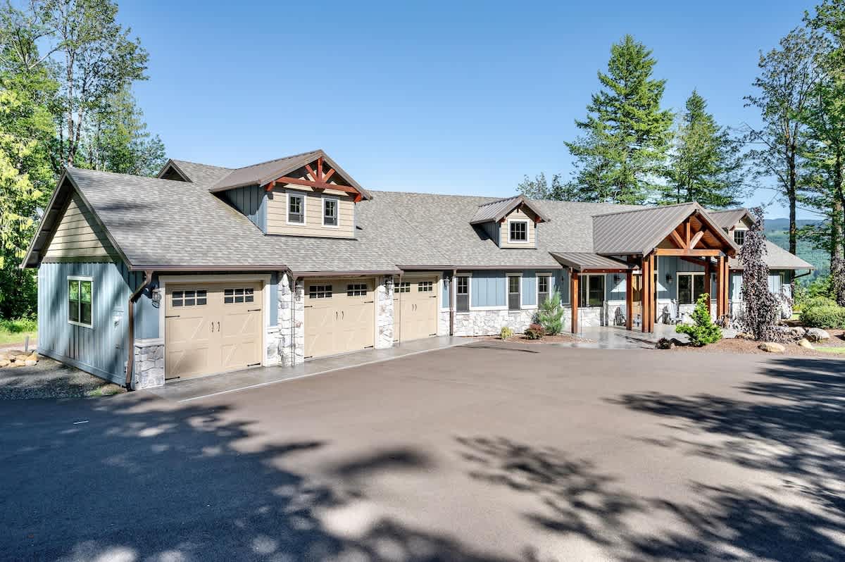 Three car garage + ample parking for additional vehicles. There is RV and trailer parking on the side of the house as well.