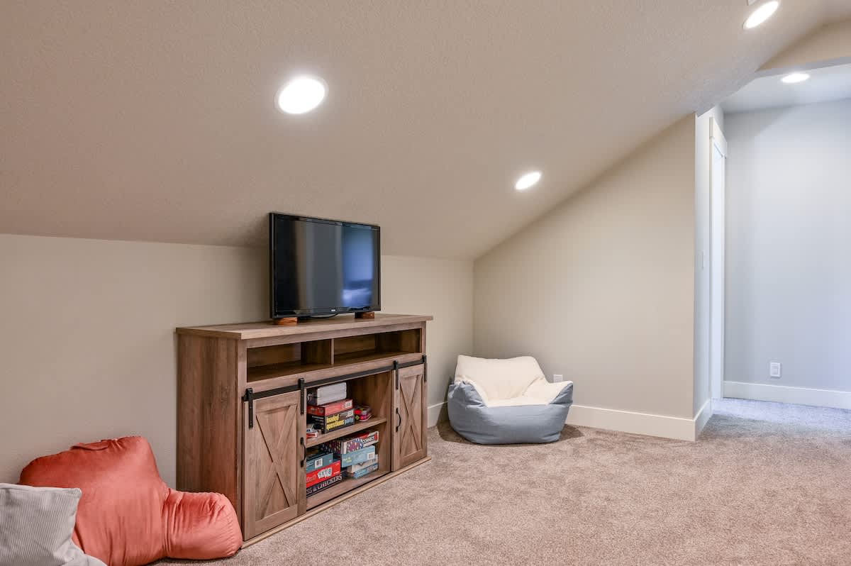 The upstairs loft is a great place for kids entertainment. Watch movies, play games, and relax in your special play space!