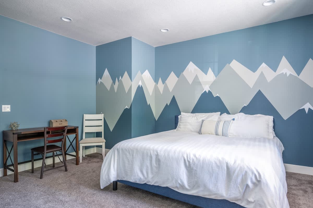Unpack your suitcase and stay awhile in this cozy guest room.