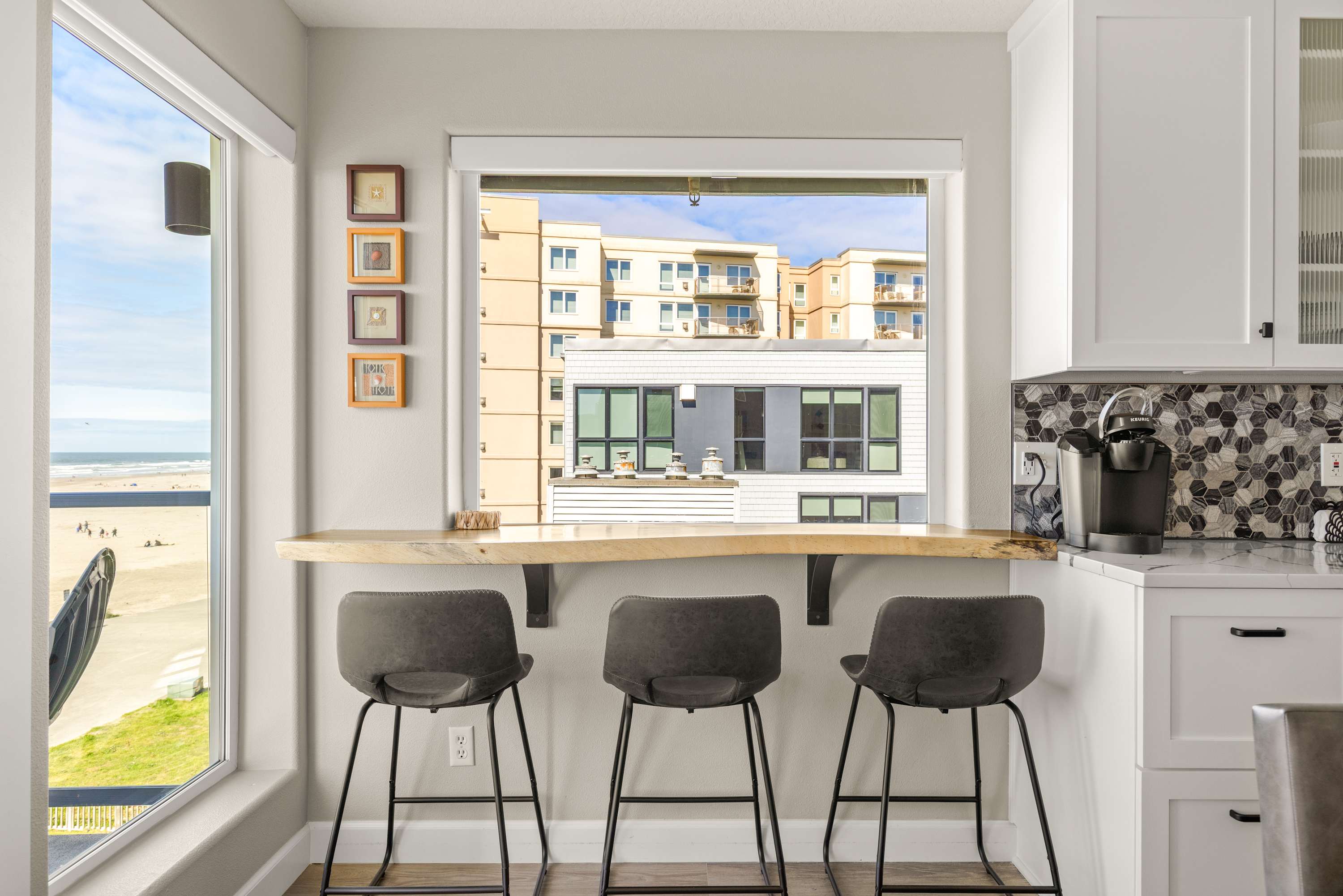 Window-side breakfast bar with seating, perfect for enjoying a peaceful start to your day.