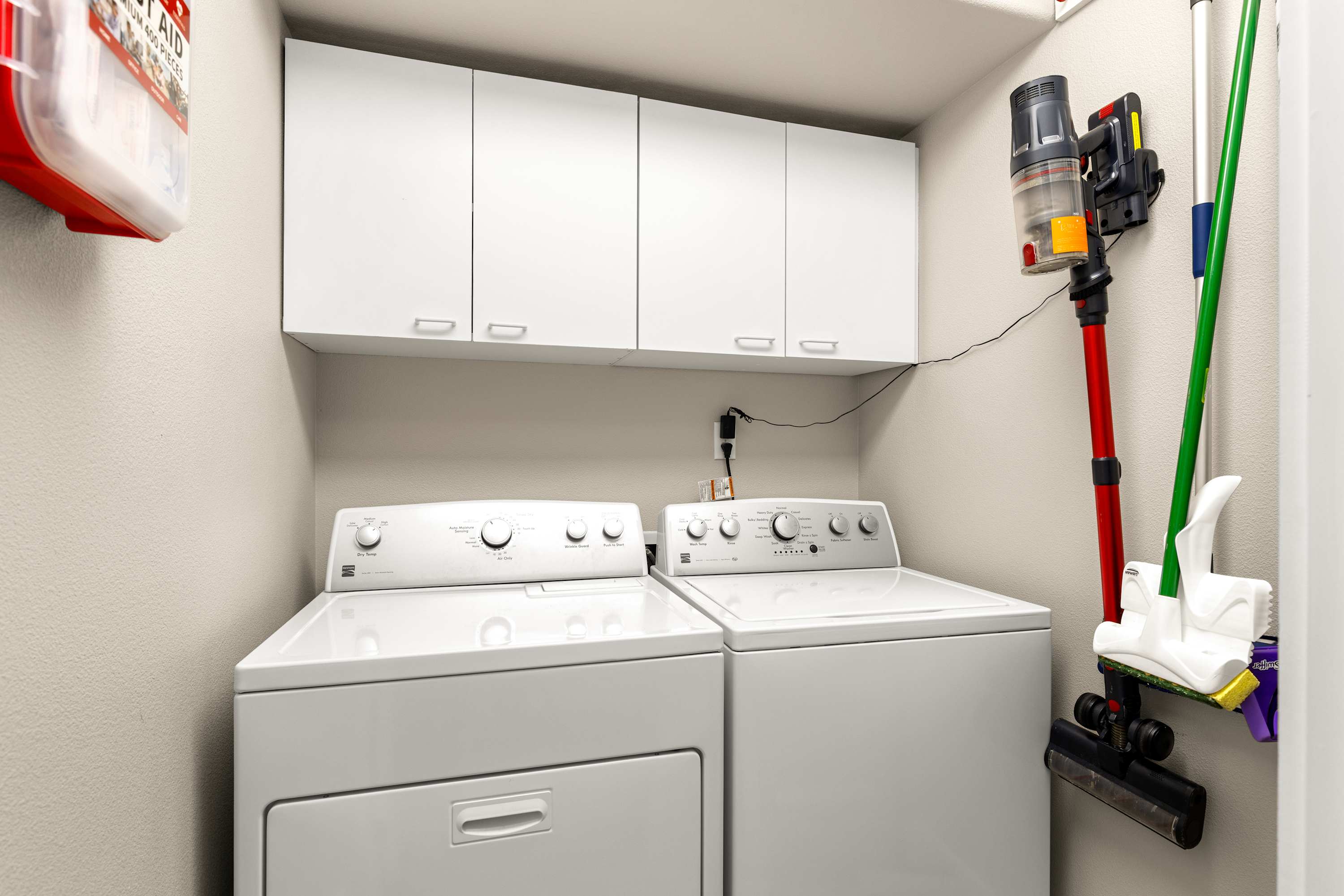 Private in-unit washer and dryer with ample storage—enjoy the convenience of home during your stay.