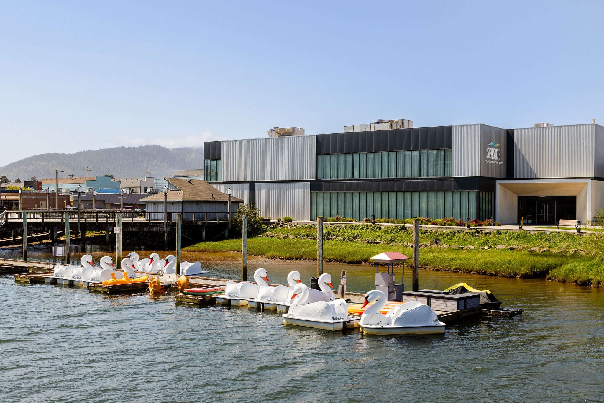 Explore Seaside’s iconic waterfront with swan paddle boats and nearby attractions just minutes from your stay.