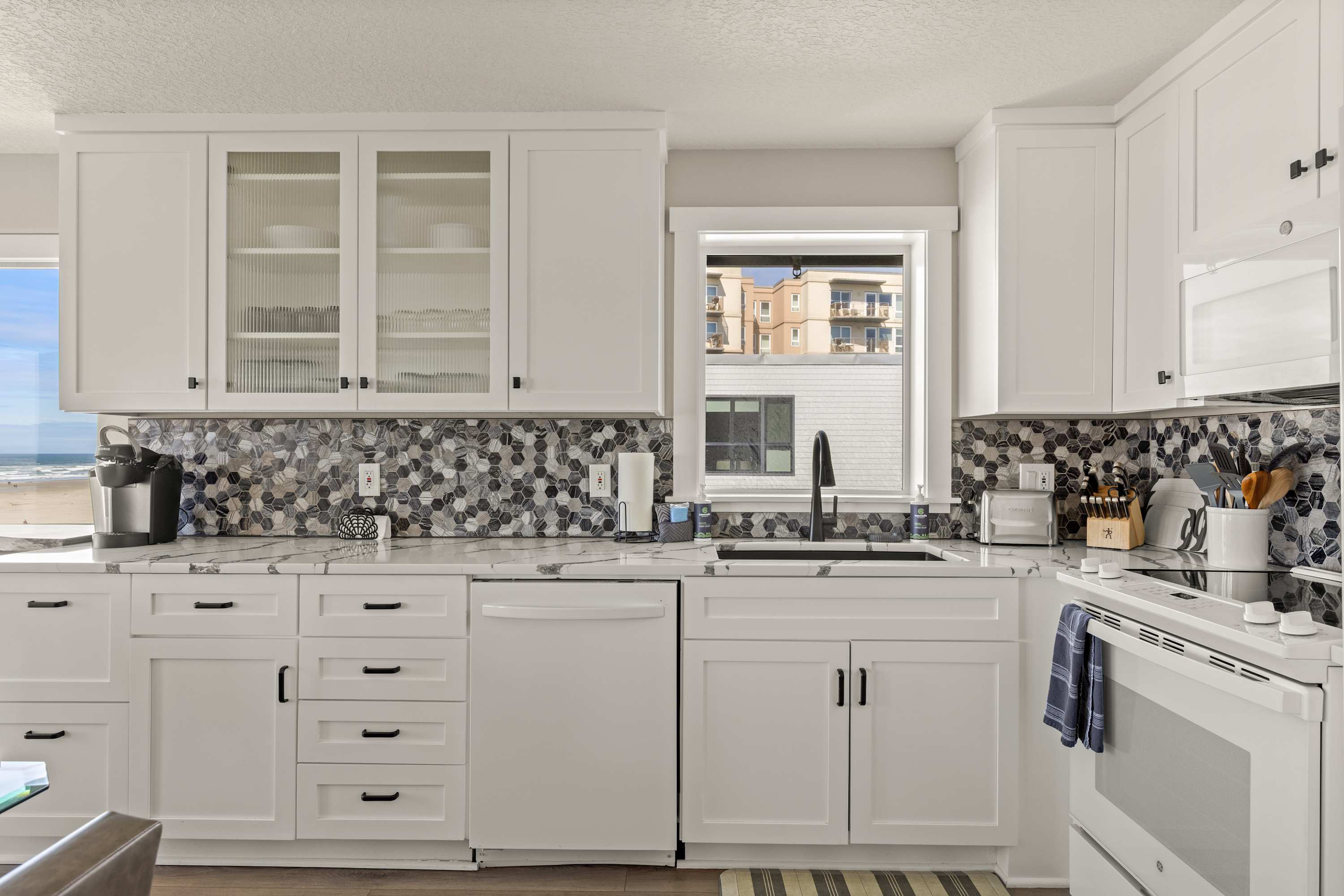 Well-appointed kitchen with modern finishes, full appliances, and functional layout for everyday use.