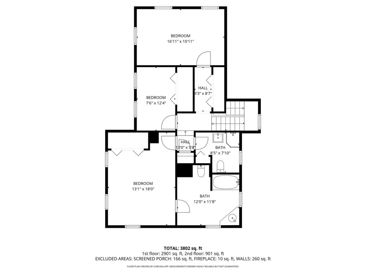 A detailed black and white floor plan illustrating the layout of the second floor, including three bedrooms and two bathrooms, with hallways and staircase access, and dimensions provided.