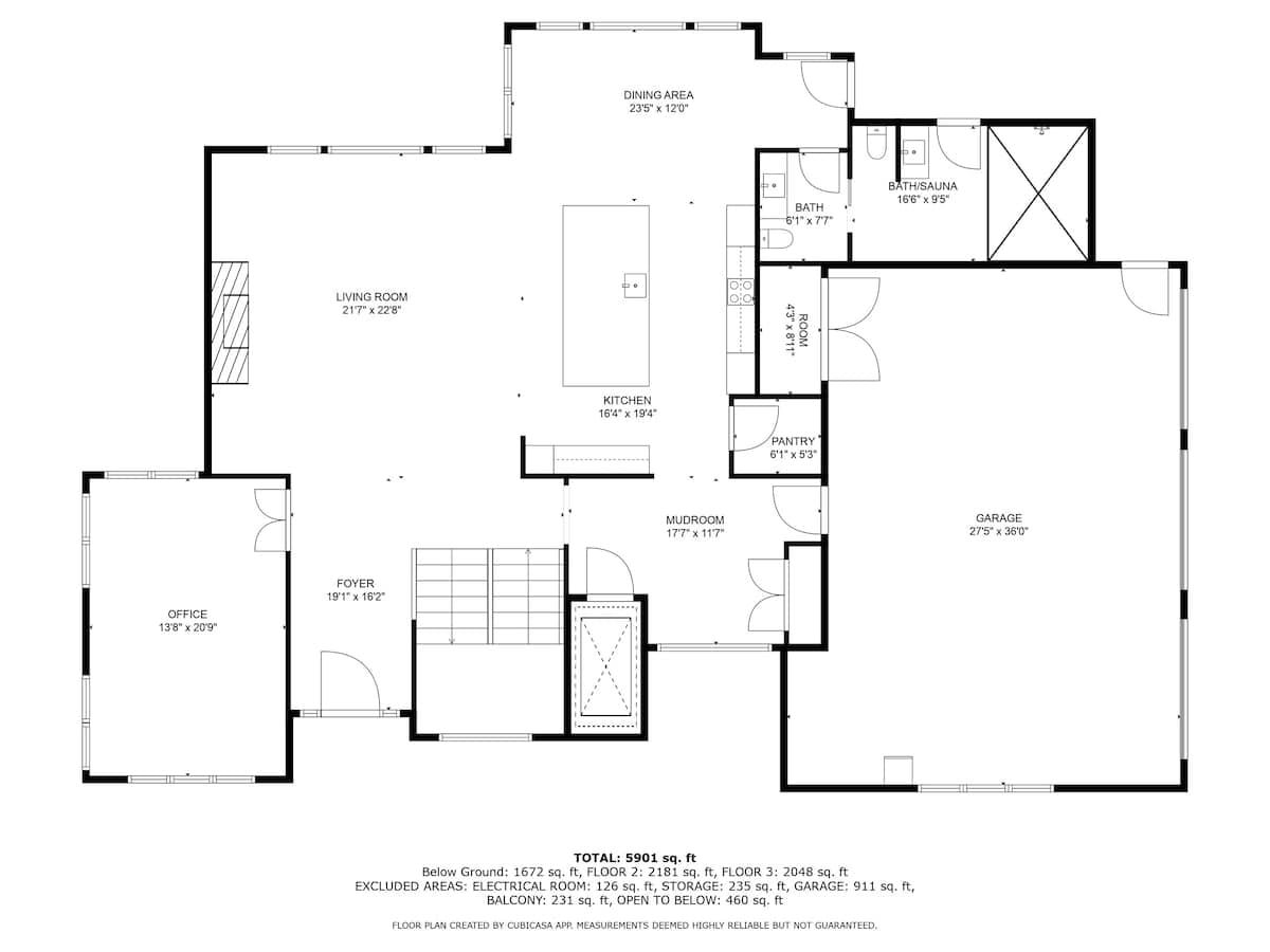 Overhead floor plan of the first level, detailing the layout of the foyer, office, living room, kitchen, dining area, mudroom, pantry, two bathrooms (one with a sauna), and a large three-car garage.