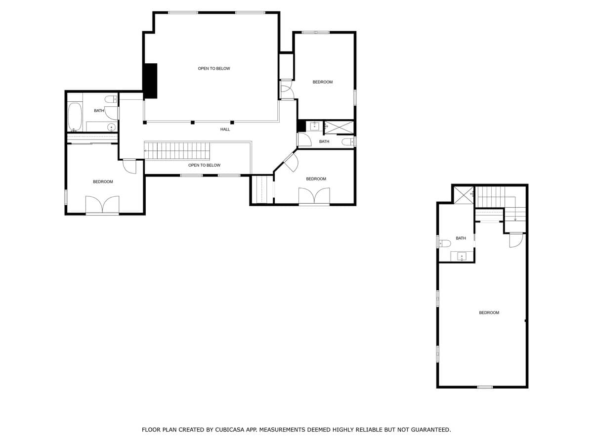 Floor plan illustrating the upper level of a multi-story house, featuring three bedrooms, three bathrooms, and a central hall with areas open to the floor below. A separate, smaller floor plan shows an additional bedroom and bath.