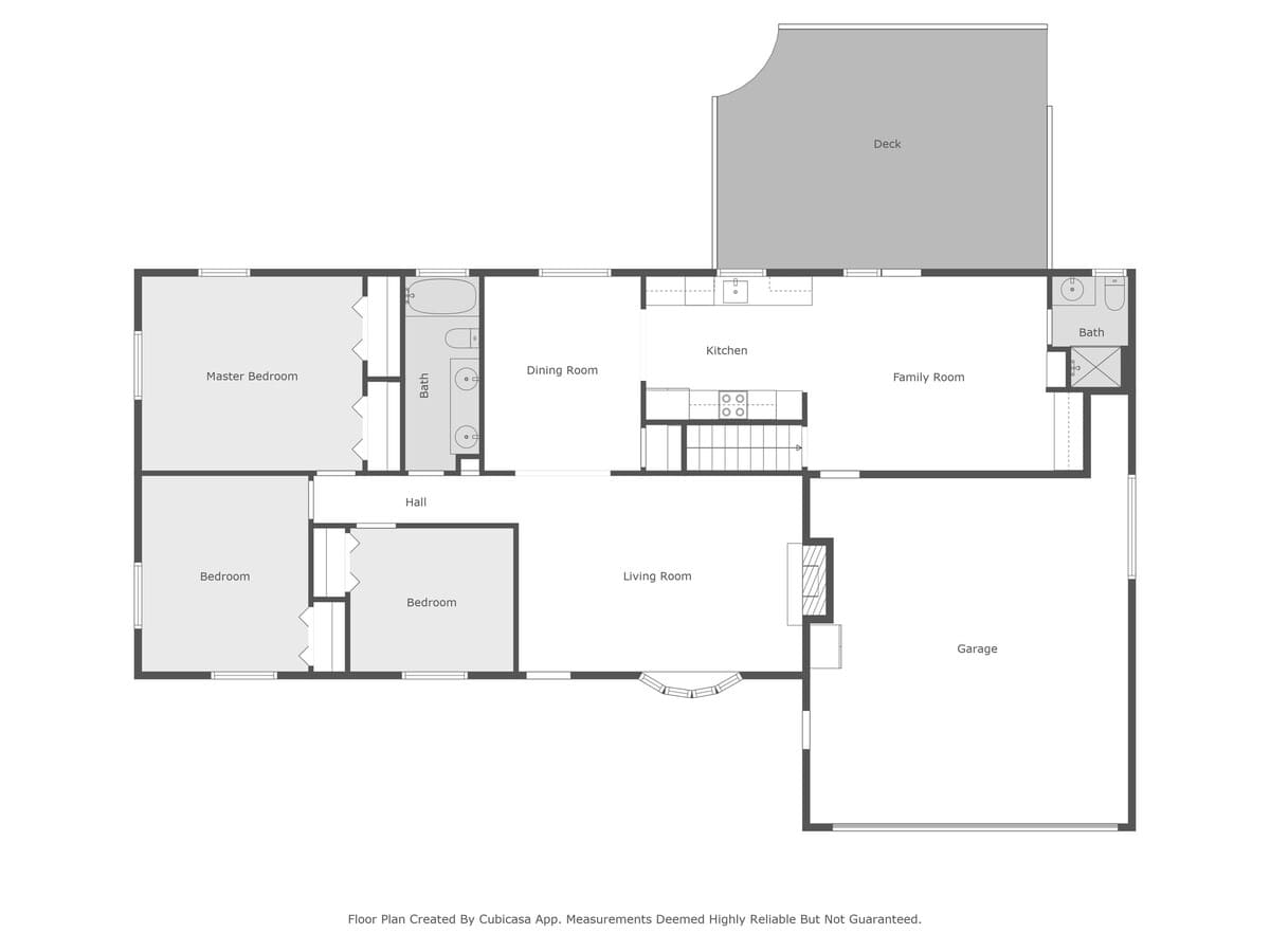 A black and white floor plan illustrating the layout of a single-story house, detailing rooms such as master bedroom, bedrooms, bathrooms, dining room, kitchen, family room, living room, garage, and an outdoor deck.