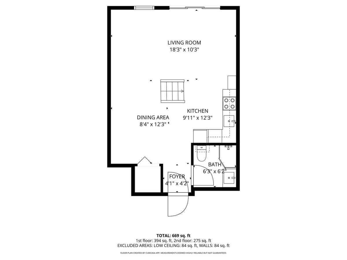Detailed floor plan illustrating the layout of the first floor, including a living room, dining area, kitchen, foyer, and a full bathroom, with dimensions provided for each space.