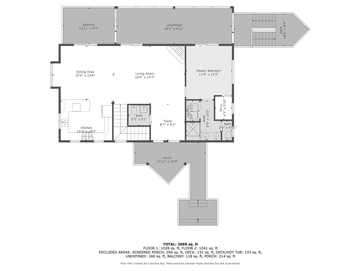 A detailed floor plan of the first level, showcasing the layout of the kitchen, dining area, living room, master bedroom, and various outdoor spaces like a porch, balcony, and deck. Dimensions for each room are clearly indicated.