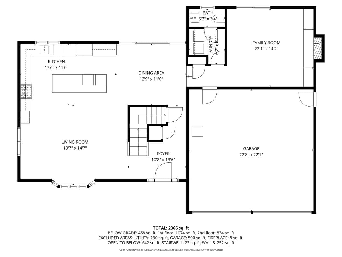 A detailed black and white floor plan illustrates the first level of the house, showing the layout of the kitchen, dining area, living room, foyer, family room, laundry, bath, and garage with dimensions.