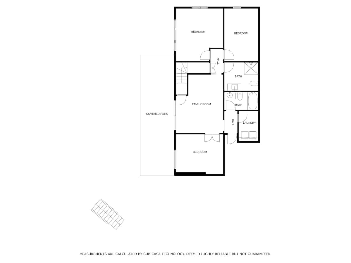 A detailed floor plan illustrating the layout of the lower level of the property, showing bedrooms, bathrooms, a family room, and a covered patio.