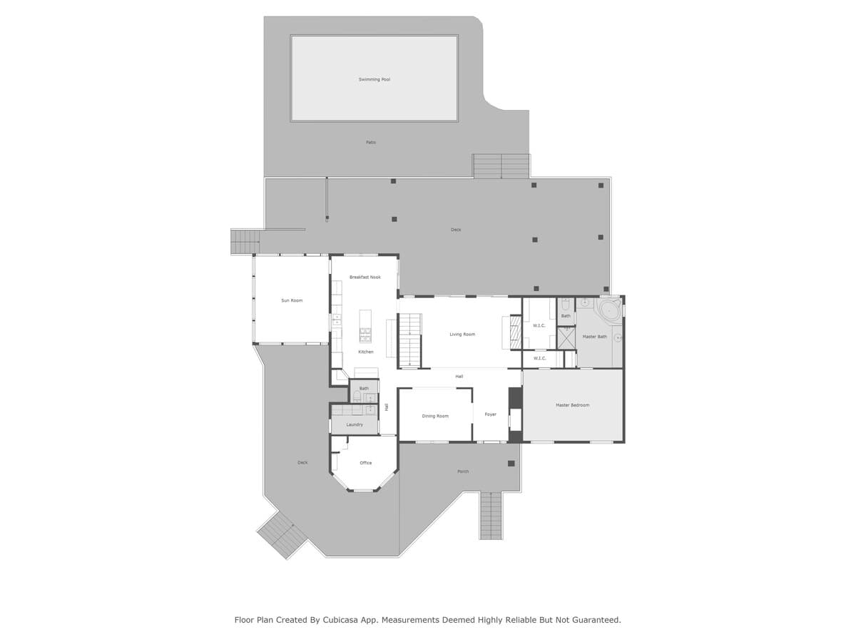 Detailed floor plan of the main level, highlighting a master bedroom suite, kitchen, living and dining rooms, an office, laundry, sunroom, and direct access to a swimming pool, patio, and deck.