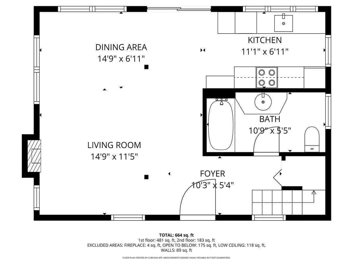 A black and white floor plan of the first floor, showing a living room, dining area, kitchen, bath, and foyer, with dimensions and total square footage listed below.