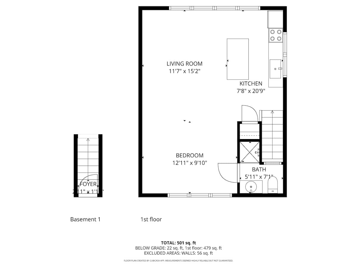 A black and white floor plan diagram outlines the '1st floor' layout, featuring a living room, kitchen, bedroom, and bath, along with a small 'foyer' indicated in the basement. Key dimensions and a total area of 501 sq. ft. are clearly labeled.