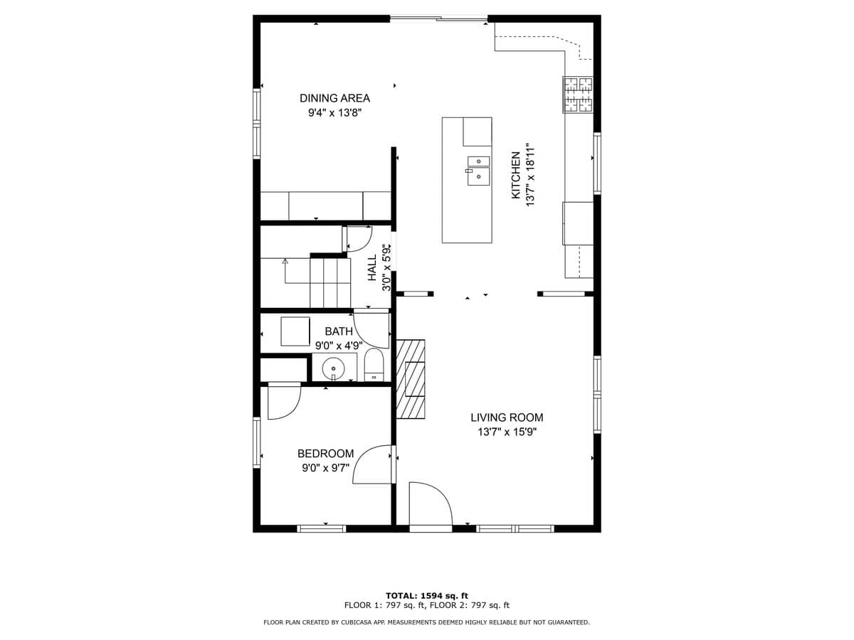 A detailed floor plan illustrates the layout of the first floor, featuring a kitchen, dining area, living room, one bedroom, and one bathroom. Dimensions for each space are clearly labeled.