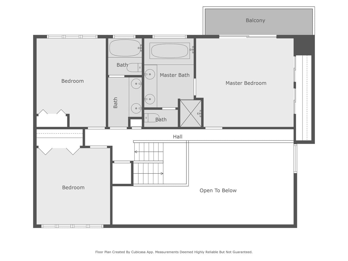 The floor plan for the third level, featuring two bedrooms, multiple bathrooms including a master bath, a master bedroom with a balcony, and an "Open To Below" area.