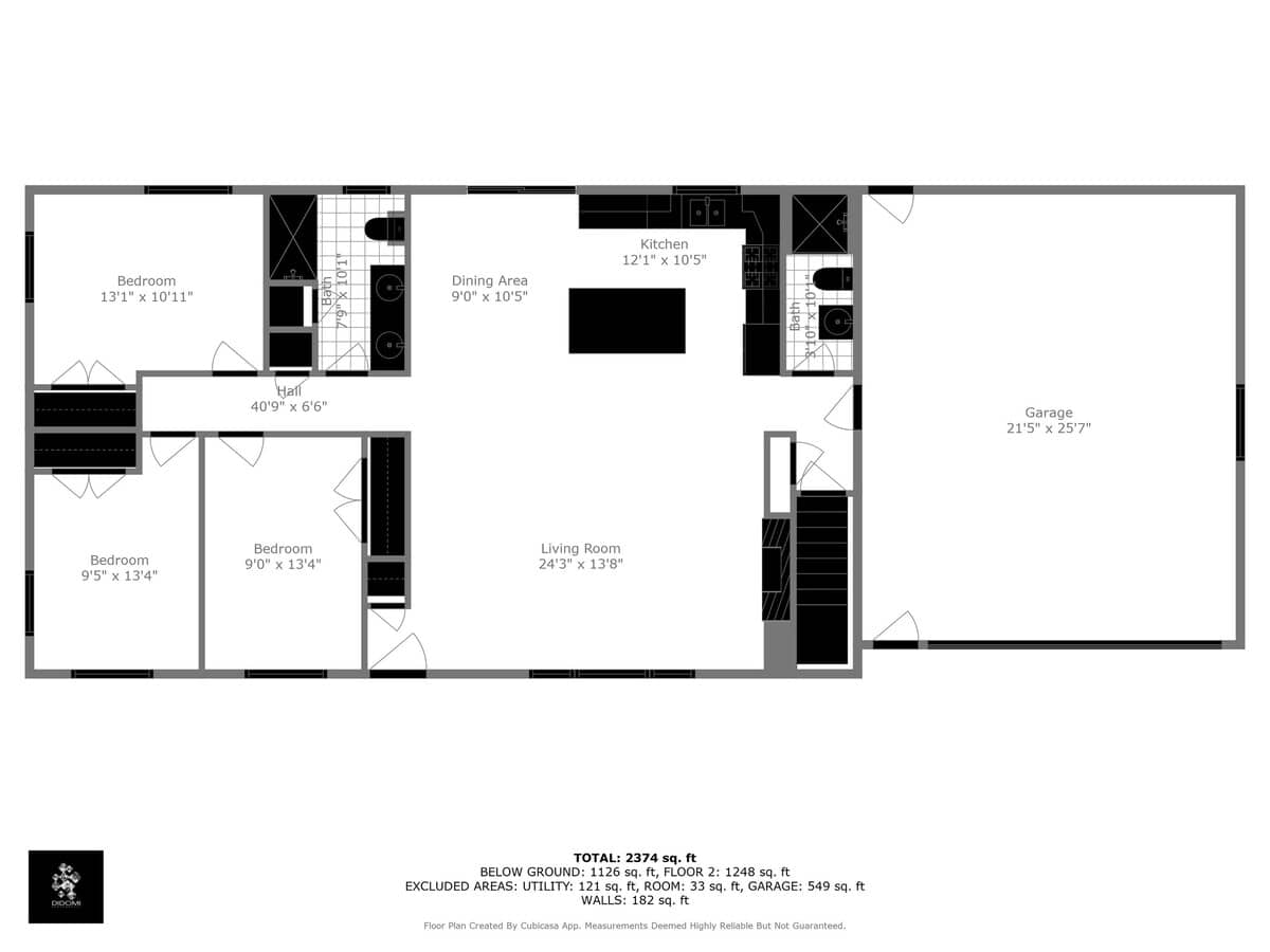 A black and white floor plan diagram of the main level of the house, showing a kitchen, dining area, living room, three bedrooms, two bathrooms, a hall, and an attached garage, with dimensions labeled.