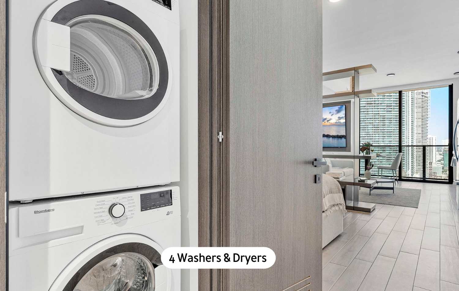 Compact laundry area featuring a stacked white washer and dryer unit, conveniently located near the living space, indicating in-unit laundry facilities.