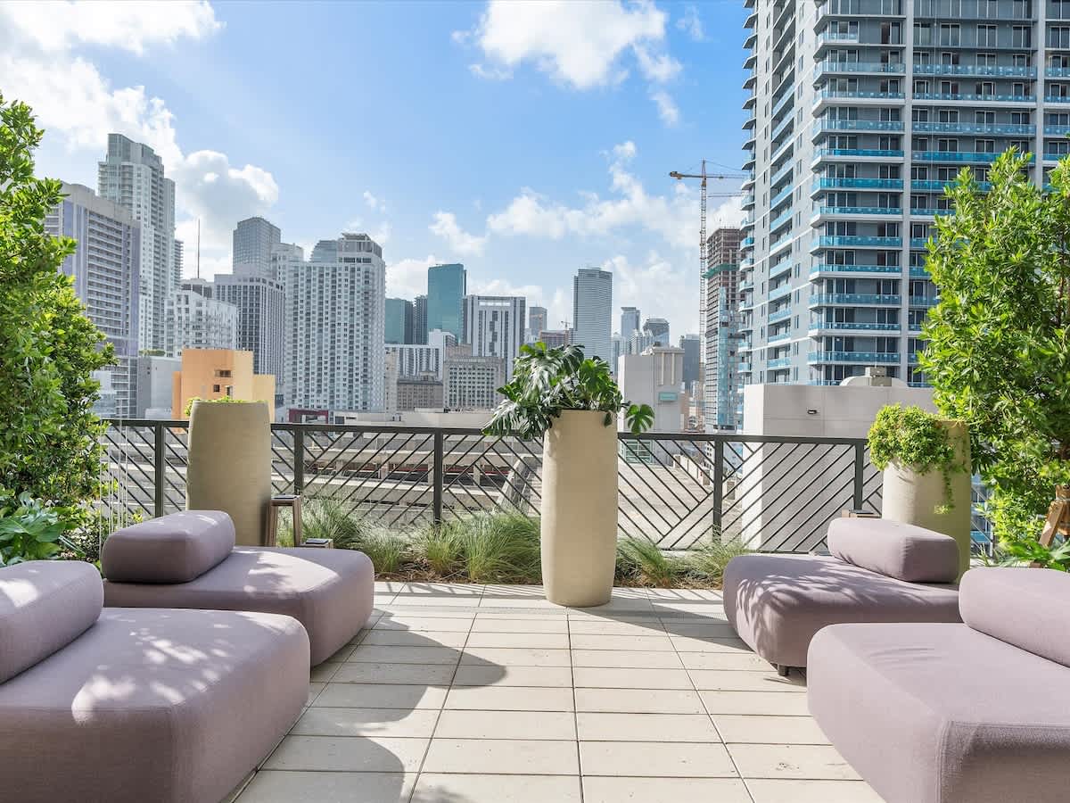 Deck, Sleek Urban Apartment - Walk to Kaseya Center