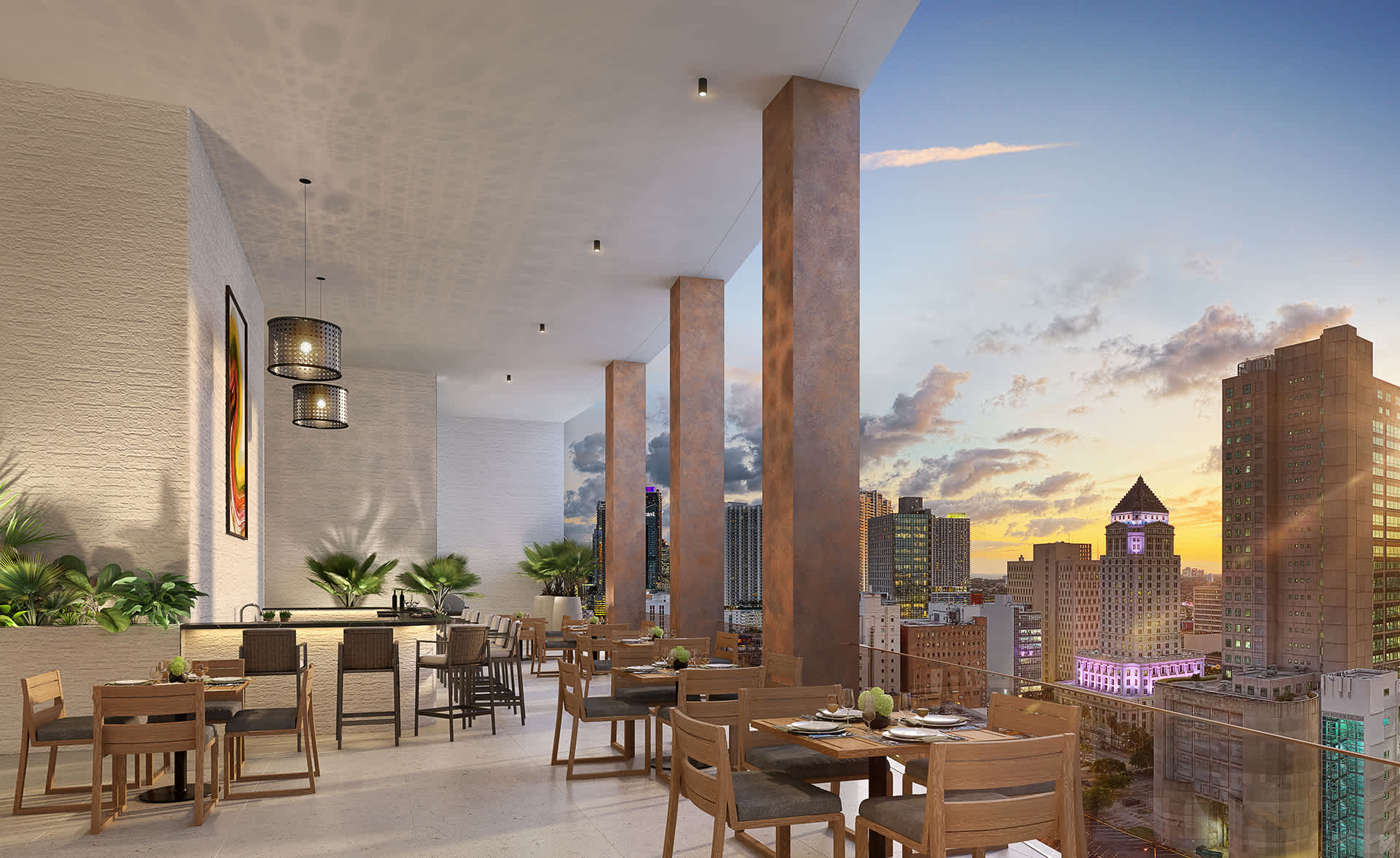 An elegant outdoor dining area features multiple wooden tables and chairs set under a covered patio, offering a stunning city view at dusk with warm lighting and tall concrete pillars.