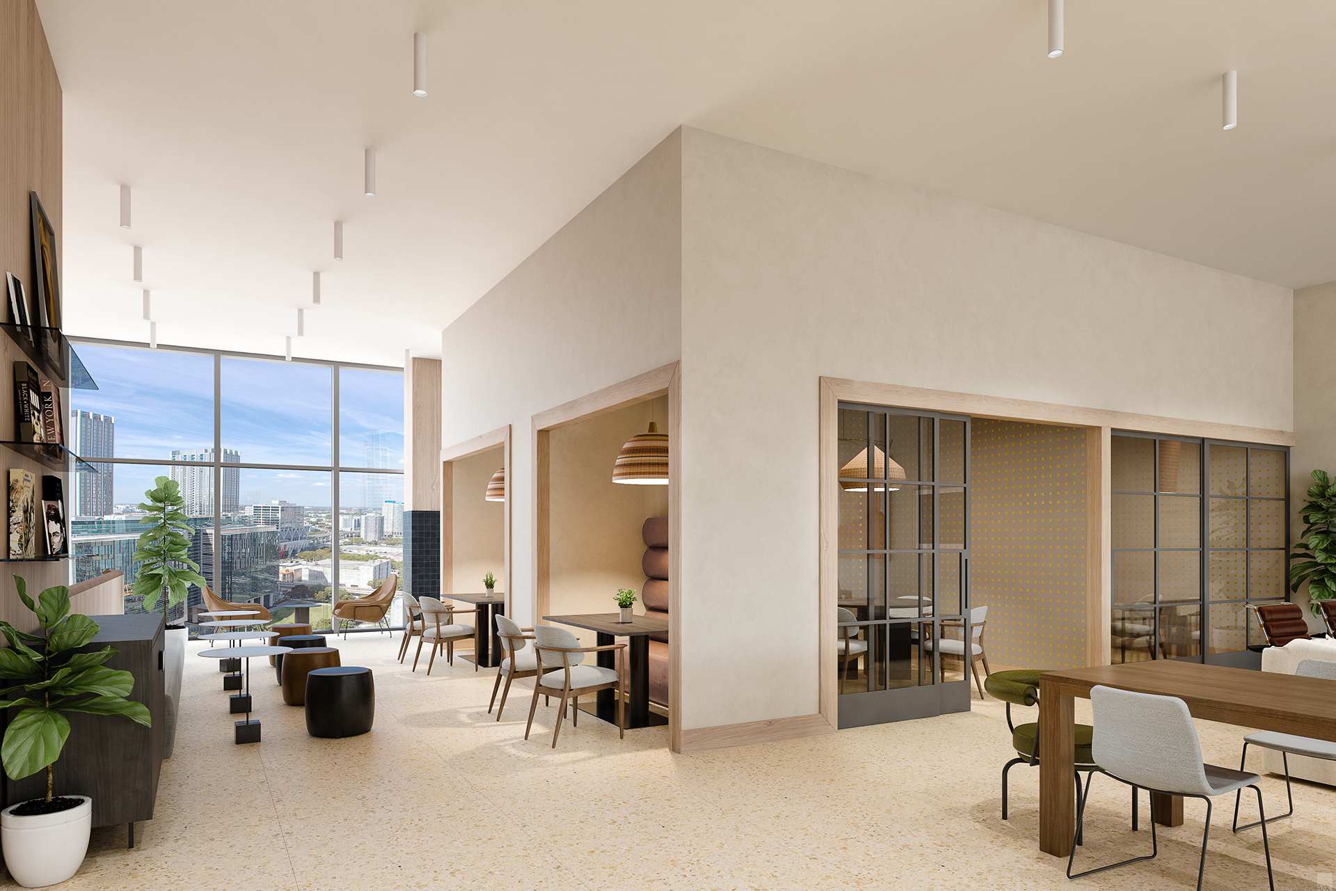 Bright and airy co-working or cafe space with multiple seating arrangements, including private booths with pendant lighting, large windows offering panoramic city views, and light-colored terrazzo flooring.