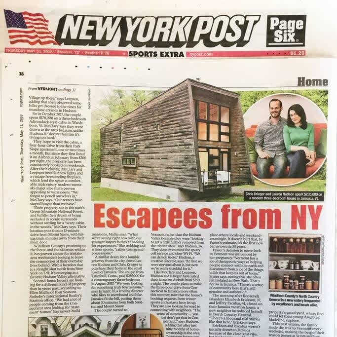A newspaper article from the New York Post, 'Escapades from NY,' features the modern cabin with a couple, Chris Krieger and Lauren Hudson, in a smaller inset photo. The article discusses their three-bedroom house in Jamaica, VT.