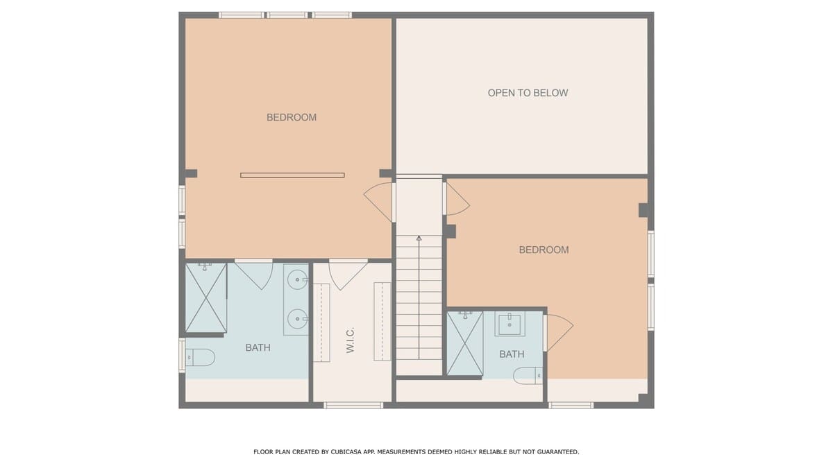 Floor plan depicting the upper level with two bedrooms, two bathrooms, and a walk-in closet. A section is marked 'open to below', indicating a double-height space or void.