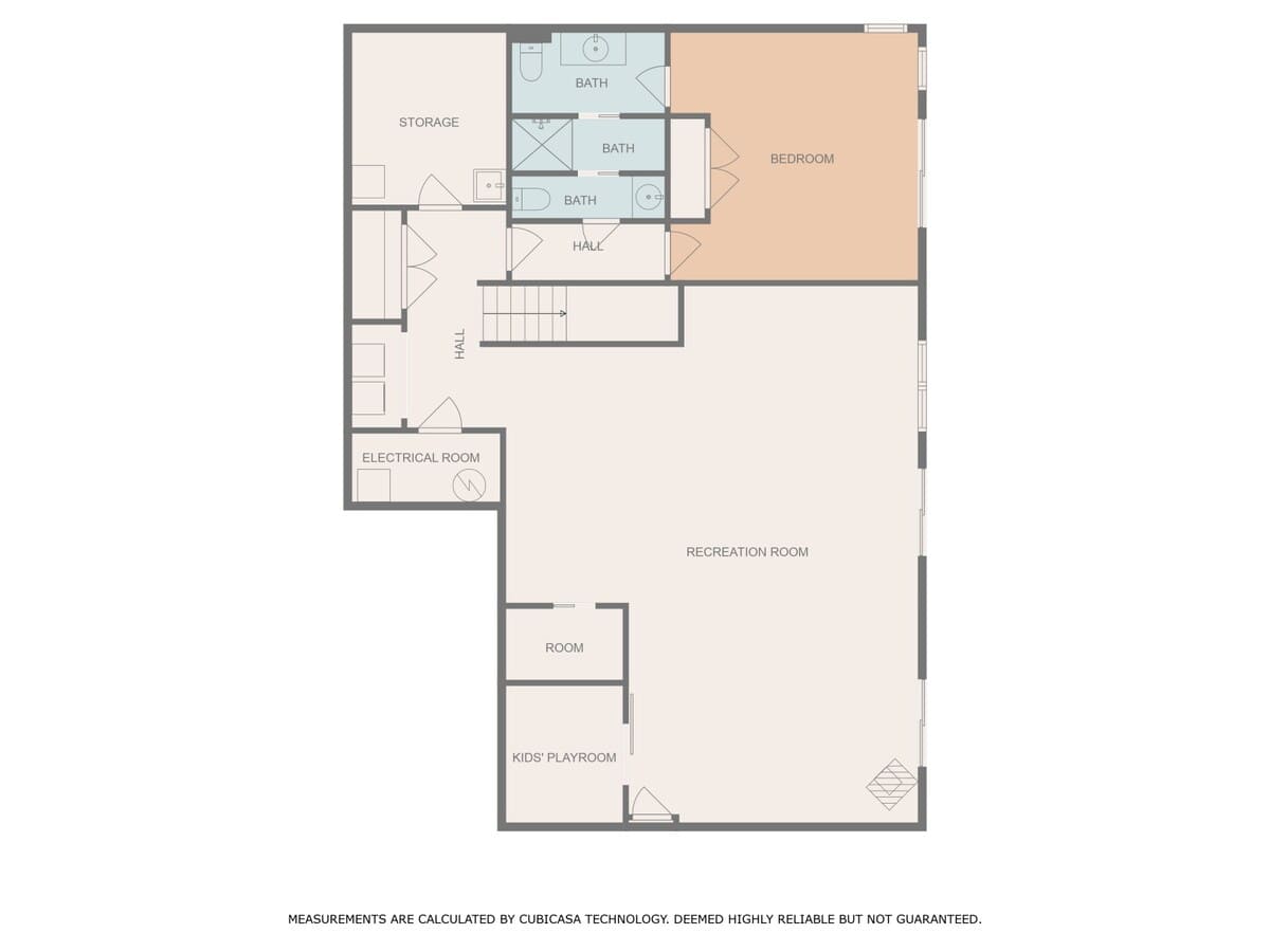 A floor plan for the first level, featuring a large recreation room, a kids' playroom, an electrical room, storage, a bedroom, and multiple bathrooms, with stairs leading to upper levels.