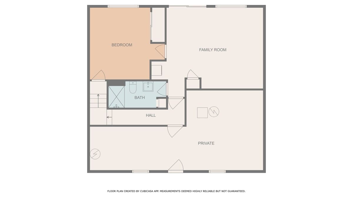 Detailed floor plan of the first level, highlighting a bedroom, family room, hall, and bathroom, with a 'private' area, indicating the lower level of the house.