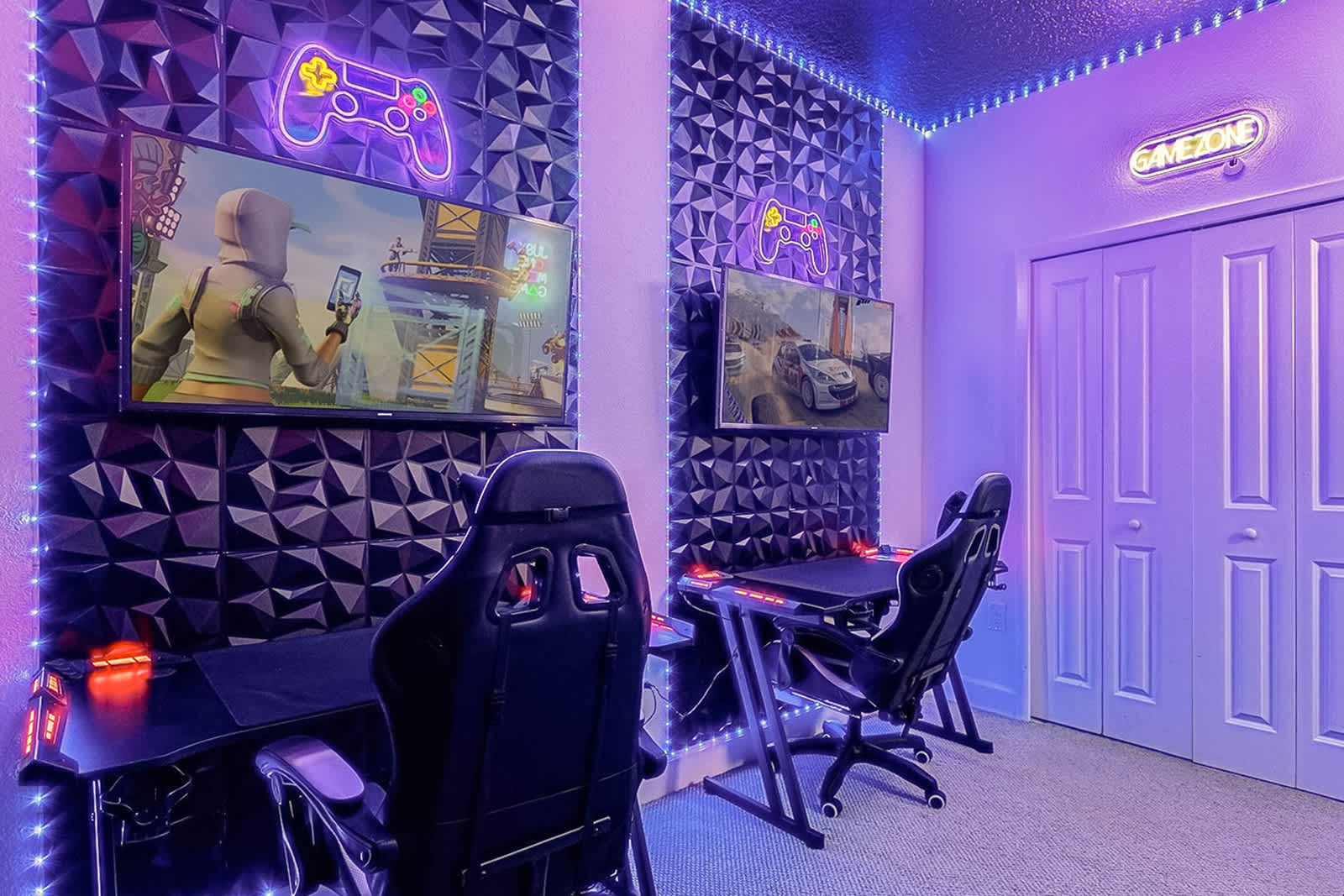 Dynamic game room showcasing two gaming stations with large monitors, ergonomic chairs, and purple neon lighting. Geometric wall panels and a 'GAME ZONE' sign enhance the theme.